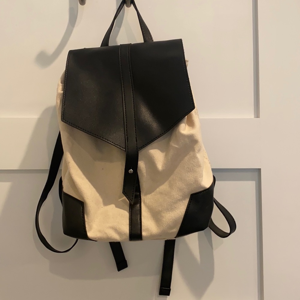 Little tan and black backpack